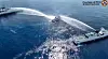 A screen capture from a video shows the Philippine Coast Guard ship BRP Bagacay being hit by water cannons from Chinese coast guard vessels near the Chinese-controlled Scarborough Shoal in the disputed waters of the South China Sea. [PHILIPPINE COAST GUARD, AFP/YONHAP]