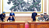 President Moon Jae-in, back row left, and North Korean leader Kim Jong-un, back row right, watch South Korean Defense Minister Song Young-moo and North Korean Minister of the People’s Armed Forces No Kwang-chol sign the Comprehensive Military Agreement after the inter-Korean summit in Pyongyang on Sept. 19, 2018. [JOINT PRESS CORPS]
