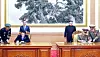 President Moon Jae-in, back row left, and North Korean leader Kim Jong-un, back row right, watch South Korean Defense Minister Song Young-moo and North Korean Minister of the People’s Armed Forces No Kwang-chol sign the Comprehensive Military Agreement after the inter-Korean summit in Pyongyang on Sept. 19, 2018. [JOINT PRESS CORPS]