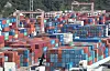 Containers are stacked at a port in Busan on Sept. 9. [NEWS1]