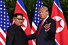 U.S. President Donald Trump, right, gestures as he meets with North Korea's leader Kim Jong-un at the start of their historic U.S.-North Korea summit, at the Capella Hotel on Sentosa island in Singapore on June 12, 2018. [AFP/YONHAP]
