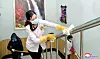 Workers in Pyongyang disinfect a building in a photograph released by the official Korean Central News Agency. The regime recently stepped up anti-viral restrictions, state media said Sunday. [YONHAP]