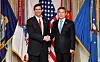 U.S. Defense Secretary Mark Esper, left, shakes hands with South Korean Defense Minister Jeong Kyeong-doo at the Pentagon in Washington on Feb. 24. [YONHAP]
