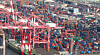 Containers are piled up at a port in Busan on Sept. 13. [YONHAP]