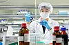 An SK bioscience researcher conducts tests to develop a Covid-19 vaccine at the company's lab. [SK BIOSCIENCE]
