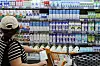 Different brands of fresh milk are displayed at a supermarket in Seoul on Tuesday. [YONHAP]
