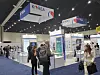 Visitors to the BIO International Convention take a look at Korean pharmaceutical companies' booths in San Diego last month. [SARAH CHEA]