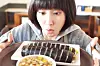 Woo Young-woo holds a tray with gimbap in a poster for “Extraordinary Attorney Woo” (2022). [ENA, JOONGANG PHOTO]