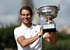Spain's Rafael Nadal poses on the Alexandre III bridge in front of the Eiffel Tower with the trophy after winning the men's singles French Open on June 6, 2022 [REUTERS/YONHAP]