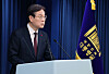 Lee Kwan-sup, senior presidential secretary for policy and planning, announces in a press briefing the interim results of a probe into misuse of government subsidies for private organizations at the Yongsan presidential office in central Seoul Wednesday. [JOINT PRESS CORPS]