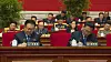 Kim Yo-jong, the younger sister of North Korea's leader, looks up while seated second from right in the second row among top officials during a session of the Eighth Workers' Party Congress this week, as shown in this screenshot from Korean Central Television. [YONHAP]
