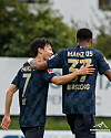 Mainz's Lee Jae-sung celebrates with teammate Delano Burgzorg during a preseason friendly against St. Gallen at the Bundesliga club's training camp in Schladming, Austria on Tuesday. Mainz won the game 4-1, with Lee scoring the side's second goal in the 22nd minute.  [MAINZ 05]