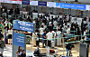 Travelers wait in line at airline counters at Incheon International Airport. [YONHAP]