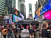 A booth for Genesis BBQ's 'One Bite to Korea' campaign held in New York's Times Square on Monday in collaboration with the Korea Tourism Organization bustles with visitors. The Korean chicken franchise handed out free samples of its flagship menu item. [GENESIS BBQ]