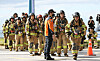 Firefighters compete in the National Firefighter Haeundae LCT Stair Competition in Busan on Oct. 26, 2022. [SONG BONG-GEUN]