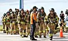 Firefighters compete in the National Firefighter Haeundae LCT Stair Competition in Busan on Oct. 26, 2022. [SONG BONG-GEUN]