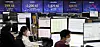 Electronic display boards at Hana Bank in central Seoul show stock and foreign exchange markets Friday. [YONHAP]〉