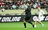 Javier Mascherano attempts a shot around a now uncharacteristically short-haired Marouane Fellaini [NEWS1]