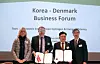 Jan Behrendt Ibsø, second from left, senior market director of COWI, and SK ecoplant CEO Park Kyung-il, third from left, pose for a photo during a signing ceremony held in Copenhagen on Monday. [SK ECOPLANT]