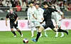 Manchester United and Korea legend Park Ji-sung takes a penalty at Seoul World Cup Stadium on Sunday. Off the ball to the far left is former Liverpool and England star Michael Owen. [NEWS1]