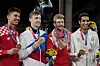 Medalist Croatia's Toni Kanaet, left, Maksim Khramtsov of the Russian Olympic Committee, second from left, Jordan's Julyana Al-Sadeq , second from right, and Egypt's Seif Eissa hold medals as they pose for photographers after a ceremony for taekwondo men's 80kg at the 2020 Summer Olympics on July 26. [REUTERS/YONHAP]