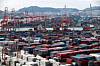 Containers stacked at a dock in the Port of Busan on Oct. 21. [YONHAP]