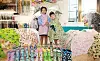 Children model rainwear such as umbrellas and raincoats in Lotte World Mall in Songpa District, southern Seoul, on Thursday. Rainwear brand HAS is offering up to 50 percent off its products for children. [YONHAP]