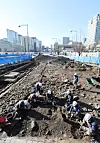 Workers holding 'homi,' a traditional Korean hoe, carefully excavate buried cultural properties discovered at the construction site of the new Gwanghwamun Plaza on March 22. [NEWS1]