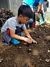 Tourists particpate in hands-on activities at the Costales Nature Farm. [PHILIPPINES DEPARTMENT OF TOURISM]