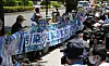 People rally in front of the Second Members' Office Building of the House of Representatives to protest the Japanese government's plan to discharge treated radioactive water into the sea in Tokyo, on Tuesday. Hundreds of Japanese people gathered at multiple locations in Tokyo on Tuesday to protest the government's plan to discharge contaminated water from the crippled Fukushima Daiichi Nuclear Power Plant into the sea, demanding the immediate suspension of the plan. [XINHUA/YONHAP]