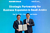 Naver Cloud CEO Kim Yu-won, left, and Rebellions founder and CEO Park Sung-hyun pose for a photo after signing a strategic partnership for business expansion in Saudi Arabia on Feb. 10 in Riyadh, Saudi Arabia. [NAVER CLOUD]