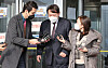 Prosecutor General Yoon Seok-youl, center, emerges from a meeting with newly appointed Justice Minister Park Beom-gye on Feb. 1. [YONHAP]