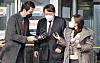 Prosecutor General Yoon Seok-youl, center, emerges from a meeting with newly appointed Justice Minister Park Beom-gye on Feb. 1. [YONHAP]