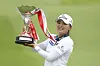 Ko Jin-young holds the championship trophy after winning the HSBC Women's World Championship golf at Sentosa Golf Club in Singapore on Sunday. [AP/YONHAP]