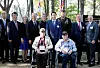 SK Group Chairman Chey Tae-won, middle, poses for a photo at a memorial ceremony with the families and members of the United States Forces Korea to honor two American veterans who fought in the 1950-53 Korean War — the late U.S. Army Major General John Singlaub and the late U.S. Army Colonel William Weber. It was held at the Imjingak Nuri Peace Park in Paju, Gyeonggi, on Thursday. [SK GROUP]