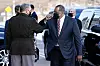 U.S. Defense Secretary Lloyd Austin, right, greets Chairman of the Joint Chiefs of Staff Mark Milley as he arrives at the Pentagon, Friday, in Washington. [AP/YONHAP]