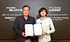 Hyundai Glovis' CEO, Lee Kyoo-bok, left, and Boyan Slat, CEO of The Ocean Cleanup, pose for a photo at Hyundai Glovis' headquarters in eastern Seoul's Seongdong District on Wednesday, commemorating the signing of a partnership aimed at combating the global challenge of ocean plastic waste. Under the partnership, Hyundai Glovis will install cameras on their vessels to gather data on the location and size of floating plastic waste, which will then be shared with the Dutch non-profit organization. Furthermore, Hyundai Glovis will provide logistical support for the transportation of The Ocean Cleanup's specialized equipment, including purpose-built barges designed to collect plastic waste from the ocean's surface. [HYUNDAI GLOVIS]