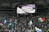 A portrait of Britain's Queen Elizabeth II is displayed on a giant screen following the announcement of her death, prior to the start of the UEFA Europa League Group F first leg football match between SS Lazio and Feyenoord Rotterdam at the Olympic stadium in Rome on Thursday. [AFP/YONHAP]