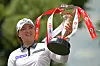 Ko Jin-young lifts the trophy during the victory ceremony after winning the HSBC Women's World Championship held at the Tanjong course of Singapore's Sentosa Golf Club on March 6. [XINHUA/YONHAP]
