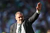 Celtic manager Ange Postecoglou acknowledges fans after winning the Scottish Cup at Hampden Park in Glasgow on Saturday. [REUTERS/YONHAP]