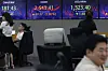 Screens in Hana Bank's trading room in central Seoul show stock and foreign exchange markets close on Monday. [YONHAP]