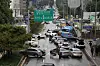Cars are left abandoned in Seocho District, southern Seoul, on Tuesday after heavy rain on Monday. [NEWS1]