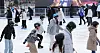 Visitors to the Seoul Plaza ice rink in Jung District, central Seoul, enjoy ice skating on Friday, the opening day. [NEWS1]