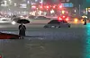 Cars are submerged in Gangnam District, southern Seoul after record heavy rains on Aug. 8. [YONHAP]