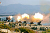 North Korea conducts a live-fire training exercise firing dozens of artillery shots with leader Kim Jong-un watching, reported Pyongyang’s official Korean Central Television on March 20, 2020. [YONHAP]