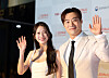 Actors Gong Seung-yeon, left, and Lee Hee-jun pose for cameras on the red carpet before the opening ceremony of the 25th Jeonju International Film Festival at Sori Arts Center in Jeonju on Wednesday. [YONHAP]