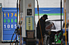 A gas station in Yangcheon District, western Seoul, advertises the price of gasoline at 1,174 won ($0.96) per liter on Tuesday. The weekly price of gasoline in Korea is expected to keep falling. [YONHAP]