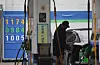 A gas station in Yangcheon District, western Seoul, advertises the price of gasoline at 1,174 won ($0.96) per liter on Tuesday. The weekly price of gasoline in Korea is expected to keep falling. [YONHAP]