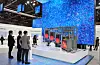 Visitors to the Posco booth at the 2024 World Climate Industry Expo (WCE) look at a model of hydrogen reduction steelmaking technology on Wednesday. [YONHAP]