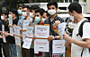 A group of Afghans living in Korea implore the government to evacuate their families from Afghanistan, fearing retaliation from the Taliban, in a press conference in front of the Foreign Ministry in central Seoul Monday. Seoul is considering support for Afghans who helped on Korean government cooperation projects in Afghanistan. [NEWS1]